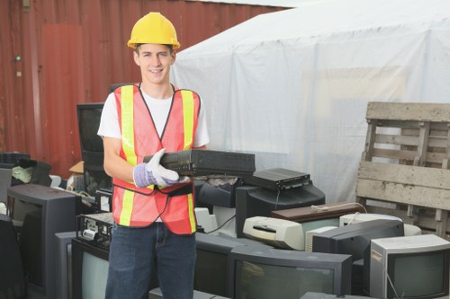 Sorting recyclable materials into labelled bins